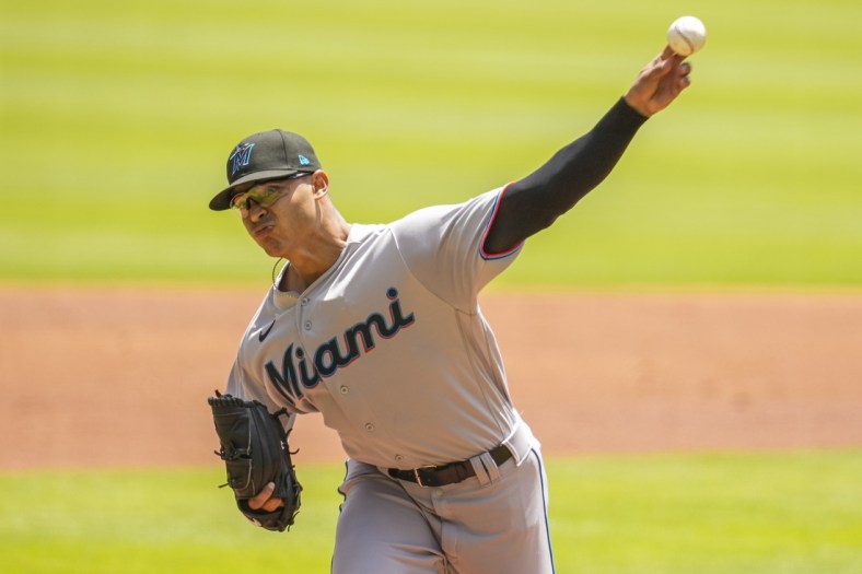 Apr 24, 2022; Cumberland, Georgia, USA; starting pitcher Jesus Luzardo (44) pitches against the Atlanta Braves during the first inning at Truist Park. Mandatory Credit: Dale Zanine-USA TODAY Sports
