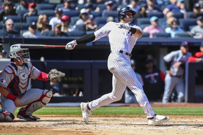 Apr 24, 2022; Bronx, New York, USA; New York Yankees left fielder Joey Gallo (13) hits an RBI double in the third inning against the Cleveland Guardians at Yankee Stadium. Mandatory Credit: Wendell Cruz-USA TODAY Sports
