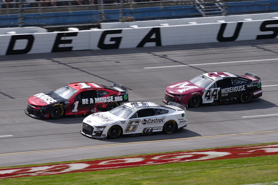 Apr 24, 2022; Talladega, Alabama, USA; NASCAR Cup Series driver Brad Keselowski (6) races NASCAR Cup Series driver Ross Chastain (1) and NASCAR Cup Series driver Greg Biffle (44) during the GEICO 500 at Talladega Superspeedway. Mandatory Credit: Jasen Vinlove-USA TODAY Sports