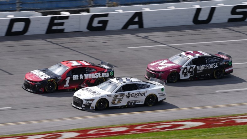 Apr 24, 2022; Talladega, Alabama, USA; NASCAR Cup Series driver Brad Keselowski (6) races NASCAR Cup Series driver Ross Chastain (1) and NASCAR Cup Series driver Greg Biffle (44) during the GEICO 500 at Talladega Superspeedway. Mandatory Credit: Jasen Vinlove-USA TODAY Sports