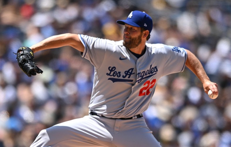 Apr 24, 2022; San Diego, California, USA; Los Angeles Dodgers starting pitcher Clayton Kershaw (22) throws a pitch against the San Diego Padres during the first inning at Petco Park. Mandatory Credit: Orlando Ramirez-USA TODAY Sports