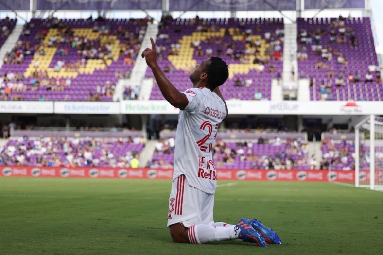Apr 24, 2022; Orlando, Florida, USA; New York Red Bulls midfielder Cristian Casseres Jr (23) celebrates scoring a goal in the second half against the Orlando City at Exploria Stadium. Mandatory Credit: Nathan Ray Seebeck-USA TODAY Sports