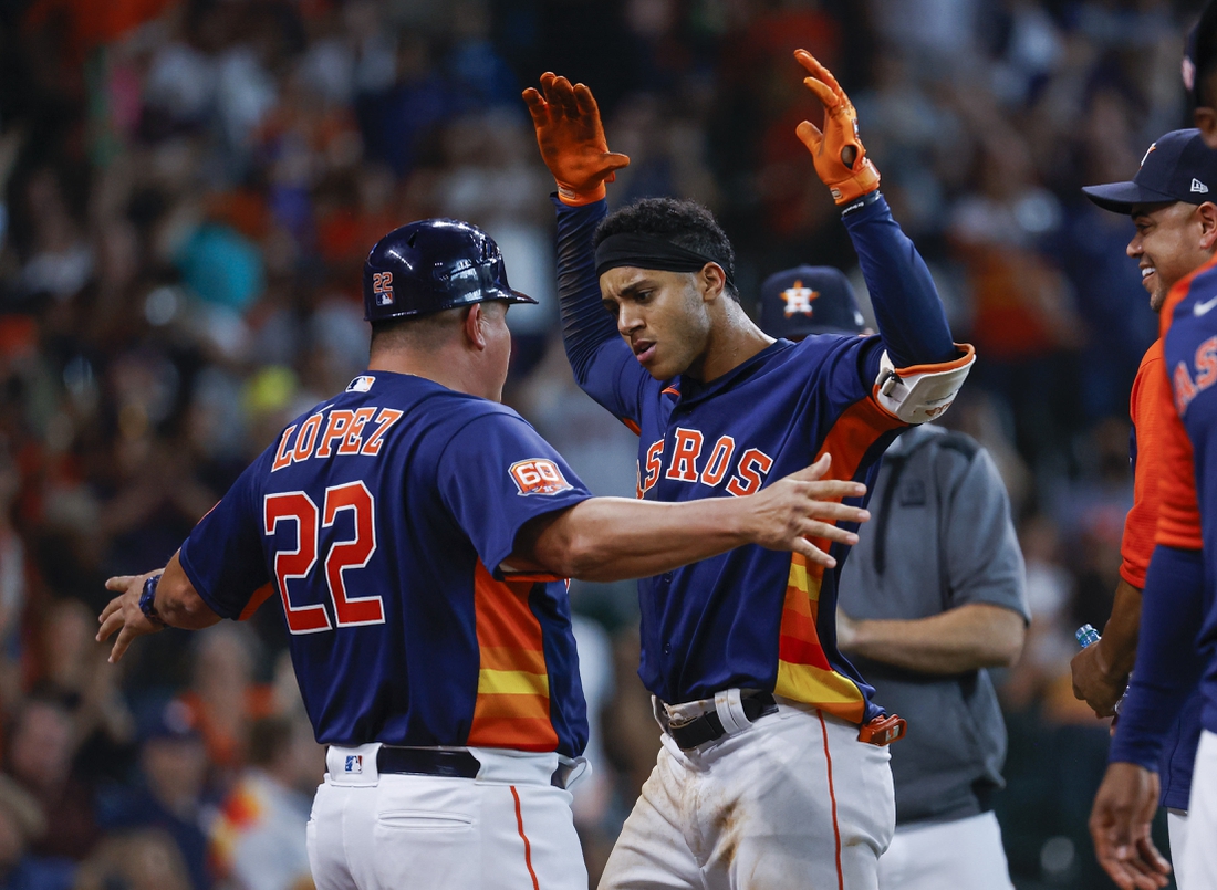 Yuli Gurriel of the Houston Astros hits a walkoff home run in the