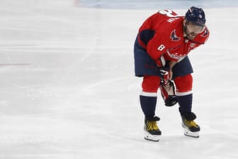 Apr 24, 2022; Washington, District of Columbia, USA; Washington Capitals left wing Alex Ovechkin (8) skates off the ice after being injured while crashing into the boards after being tripped on a breakaway attempt against the Toronto Maple Leafs in the third period at Capital One Arena. Mandatory Credit: Geoff Burke-USA TODAY Sports