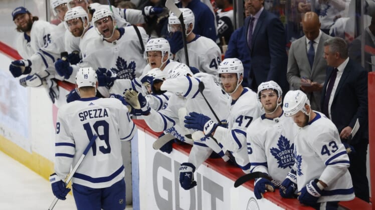 Apr 24, 2022; Washington, District of Columbia, USA; Toronto Maple Leafs center Jason Spezza (19) celebrates with teammates after scoring the game-tying goal against the Washington Capitals in the final minute of the third period at Capital One Arena. Mandatory Credit: Geoff Burke-USA TODAY Sports