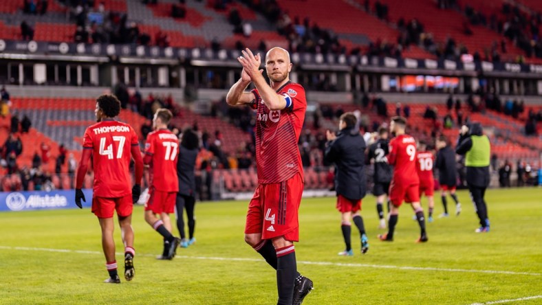 Apr 16, 2022; Toronto, Ontario, CAN; Toronto FC midfielder Michael Bradley (4) celebrates after defeating the Philadelphia Union at BMO Field. Mandatory Credit: Kevin Sousa-USA TODAY Sports