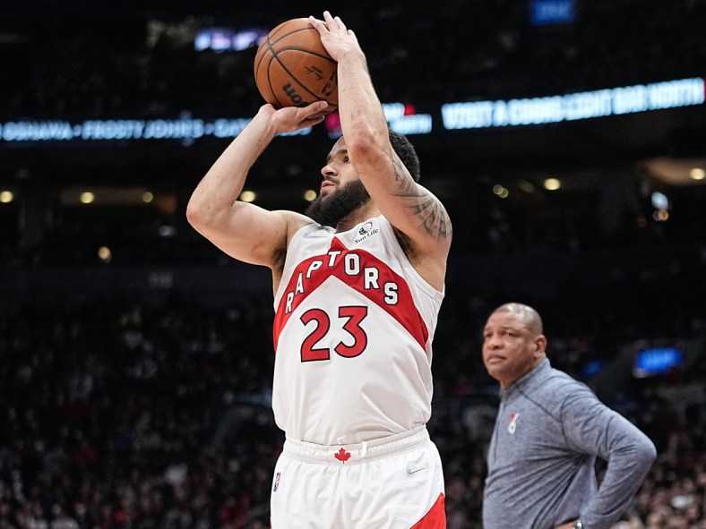 Apr 20, 2022; Toronto, Ontario, CAN; Toronto Raptors guard Fred VanVleet (23) tries to shoot for three points as Philadelphia 76ers head coach Doc Rivers looks on during game three of the first round for the 2022 NBA playoffs at Scotiabank Arena. Mandatory Credit: John E. Sokolowski-USA TODAY Sports