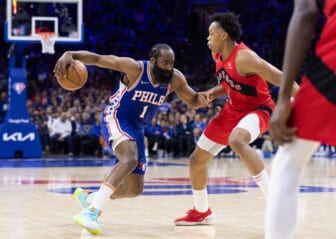 Apr 25, 2022; Philadelphia, Pennsylvania, USA; Philadelphia 76ers guard James Harden (1) dribbles the ball against Toronto Raptors forward Scottie Barnes (4) during the third quarter in game five of the first round for the 2022 NBA playoffs at Wells Fargo Center. Mandatory Credit: Bill Streicher-USA TODAY Sports