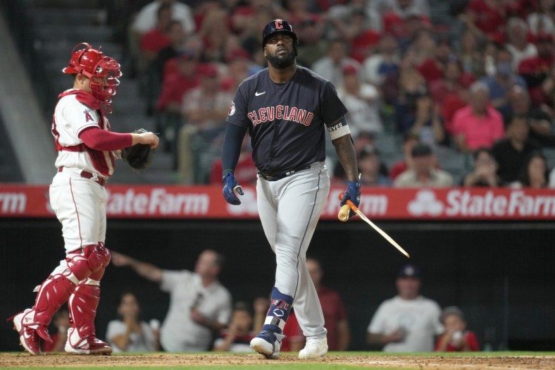 Apr 25, 2022; Anaheim, California, USA; Cleveland Guardians designated hitter Franmil Reyes (32) reacts after striking out in the sixth inning against the Los Angeles Angels  at Angel Stadium. Mandatory Credit: Kirby Lee-USA TODAY Sports