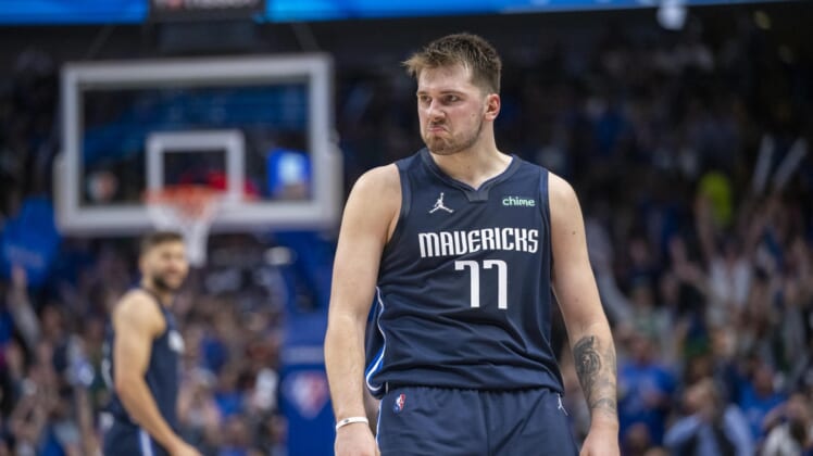 Apr 25, 2022; Dallas, Texas, USA; Dallas Mavericks guard Luka Doncic (77) celebrates making a basket against the Utah Jazz during the third quarter in game five of the first round for the 2022 NBA playoffs at American Airlines Center. Mandatory Credit: Jerome Miron-USA TODAY Sports
