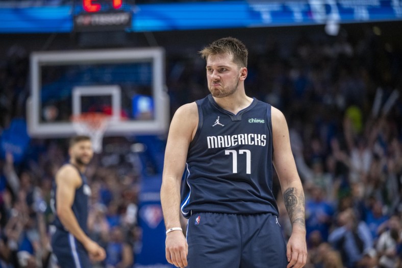 Apr 25, 2022; Dallas, Texas, USA; Dallas Mavericks guard Luka Doncic (77) celebrates making a basket against the Utah Jazz during the third quarter in game five of the first round for the 2022 NBA playoffs at American Airlines Center. Mandatory Credit: Jerome Miron-USA TODAY Sports