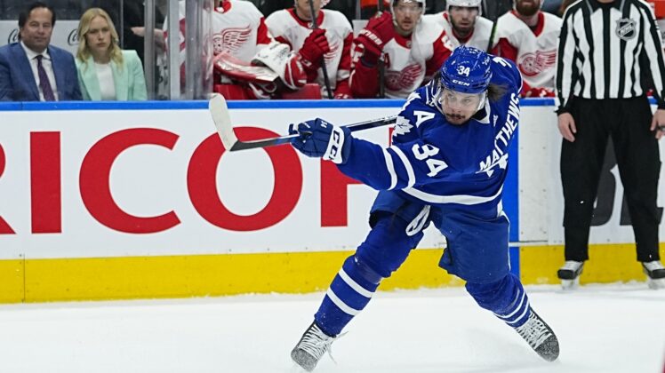 Apr 26, 2022; Toronto, Ontario, CAN; Toronto Maple Leafs forward Auston Matthews (34) shoots the puck against the Detroit Red Wings during the first period at Scotiabank Arena. Mandatory Credit: John E. Sokolowski-USA TODAY Sports