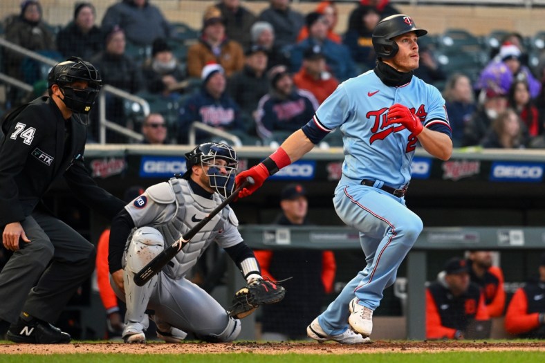Apr 26, 2022; Minneapolis, Minnesota, USA; Minnesota Twins right fielder Max Kepler (26) hits an RBI double againt the Detroit Tigers during the second inning at Target Field. Mandatory Credit: Nick Wosika-USA TODAY Sports