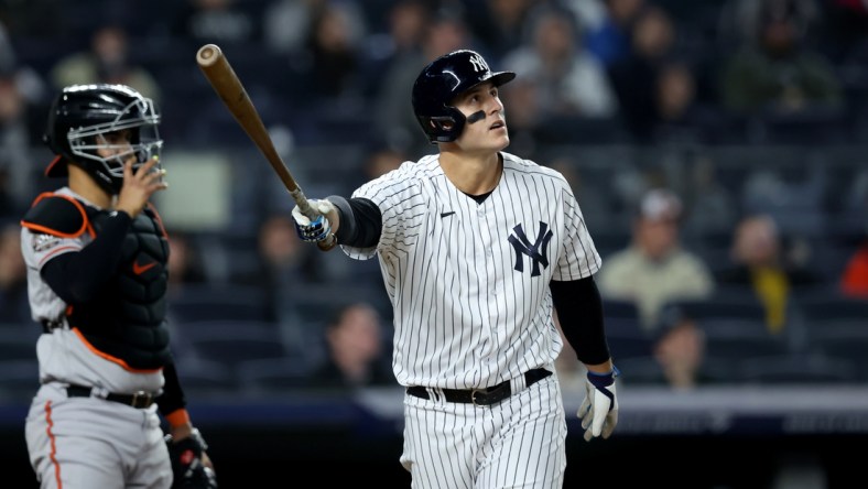 Apr 26, 2022; Bronx, New York, USA; New York Yankees first baseman Anthony Rizzo (48) follows through on a two run home run against the Baltimore Orioles during the fifth inning at Yankee Stadium. Mandatory Credit: Brad Penner-USA TODAY Sports