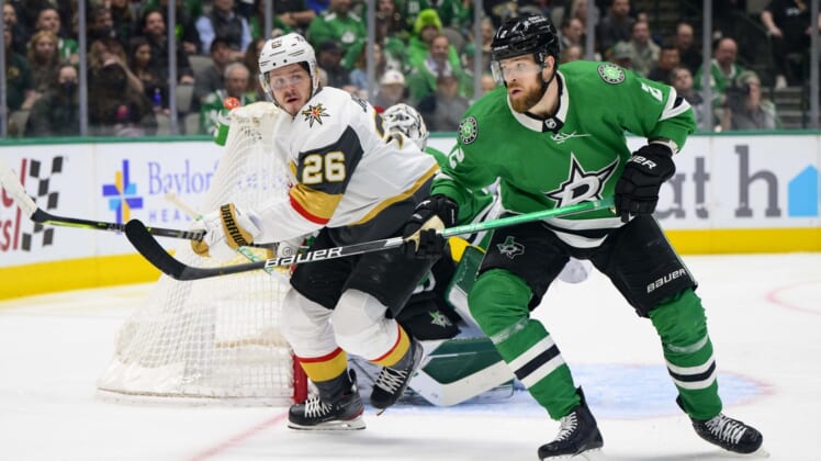 Apr 26, 2022; Dallas, Texas, USA; Dallas Stars defenseman Jani Hakanpaa (2) defends against Vegas Golden Knights center Mattias Janmark (26) during the first period at the American Airlines Center. Mandatory Credit: Jerome Miron-USA TODAY Sports