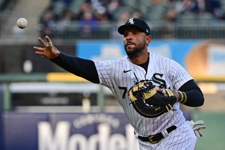Apr 26, 2022; Chicago, Illinois, USA; Chicago White Sox first baseman Jose Abreu (79) tosses the baseball to first base for the force out in the second inning against the Kansas City Royals at Guaranteed Rate Field. Mandatory Credit: Quinn Harris-USA TODAY Sports