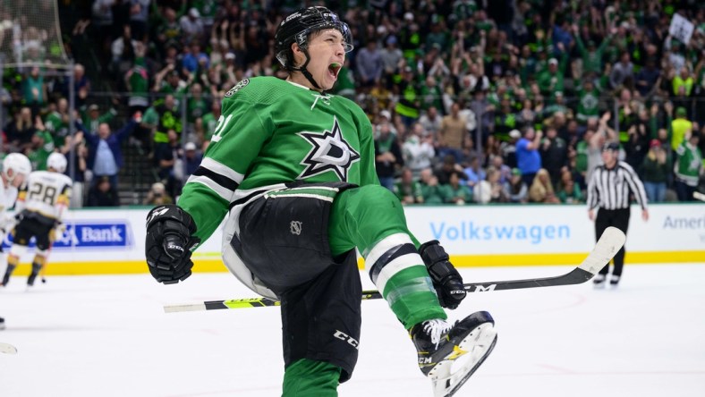 Apr 26, 2022; Dallas, Texas, USA; Dallas Stars left wing Jason Robertson (21) celebrates scoring a goal against the Vegas Golden Knights during the second period at the American Airlines Center. Mandatory Credit: Jerome Miron-USA TODAY Sports