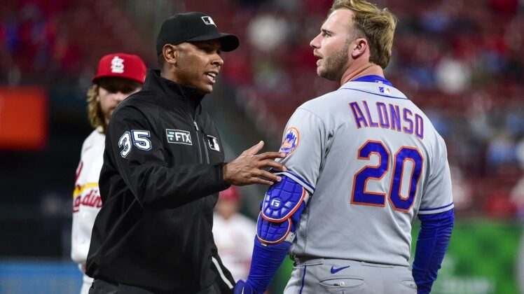Apr 26, 2022; St. Louis, Missouri, USA;  New York Mets designated hitter Pete Alonso (20) reacts after he was hit in the head from a pitch by from St. Louis Cardinals relief pitcher Kodi Whitley (not pictured) during the eighth inning at Busch Stadium. Mandatory Credit: Jeff Curry-USA TODAY Sports