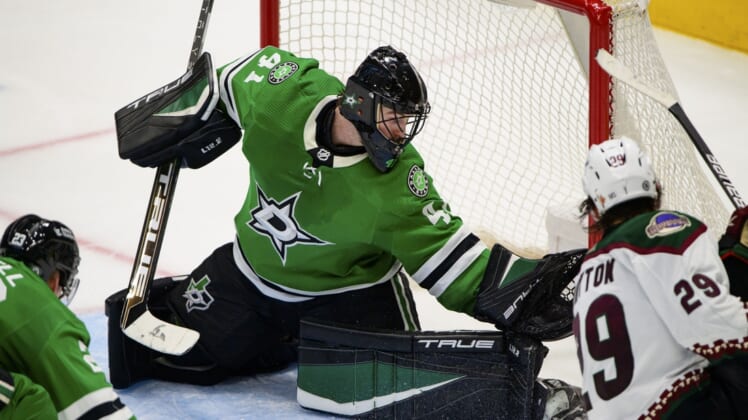 Apr 27, 2022; Dallas, Texas, USA; Arizona Coyotes center Barrett Hayton (29) scores the game tying goal against Dallas Stars goaltender Scott Wedgewood (41) during the third period at the American Airlines Center. Mandatory Credit: Jerome Miron-USA TODAY Sports