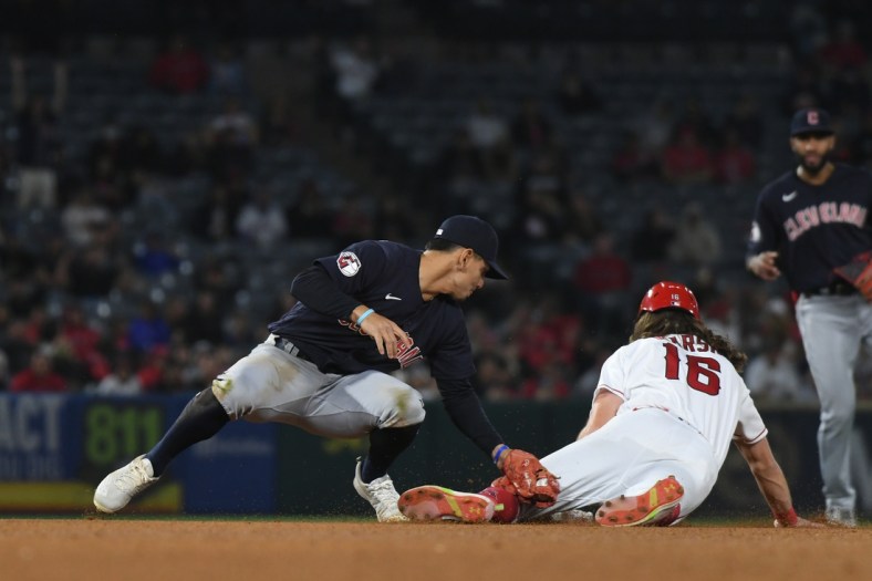 Apr 27, 2022; Anaheim, California, USA; Los Angeles Angels center fielder Brandon Marsh (16) steals second base covered by Cleveland Guardians second baseman Andres Gimenez (0) in the bottom of the fifth inning at Angel Stadium. Mandatory Credit: Richard Mackson-USA TODAY Sports