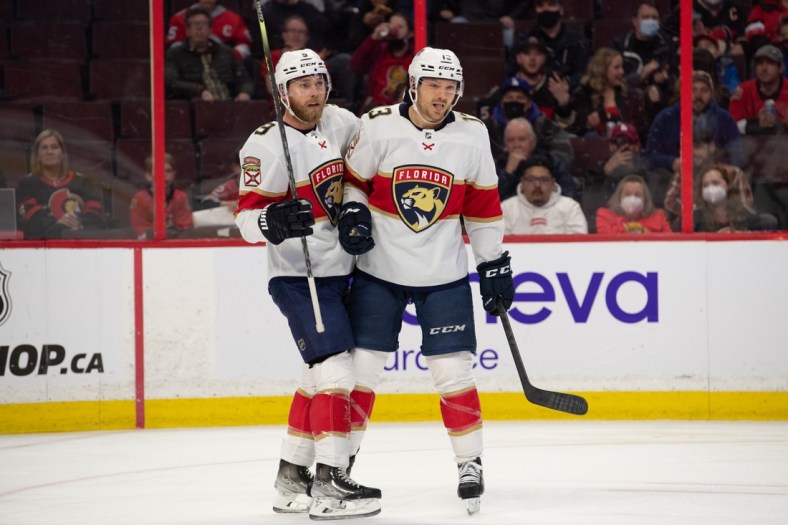 Apr 28, 2022; Ottawa, Ontario, CAN; Florida Panthers center Sam Bennett (9) celebrates a goal scored by center Sam Reinhart (13) in the first period against the  Ottawa Senators at the Canadian Tire Centre. Mandatory Credit: Marc DesRosiers-USA TODAY Sports