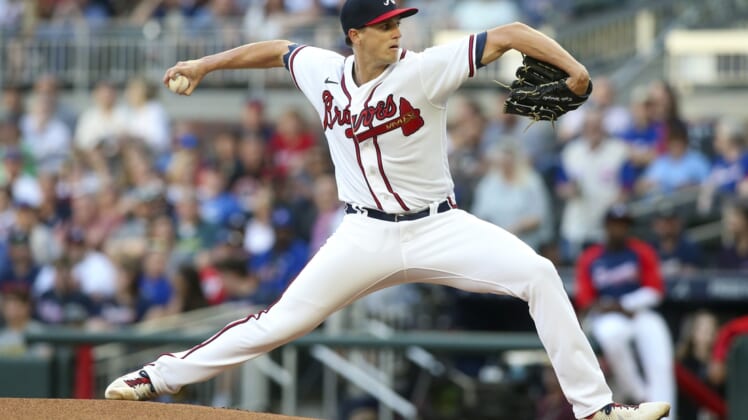 Apr 28, 2022; Atlanta, Georgia, USA; Atlanta Braves starting pitcher Kyle Wright (30) throws against the Chicago Cubs in the first inning at Truist Park. Mandatory Credit: Brett Davis-USA TODAY Sports
