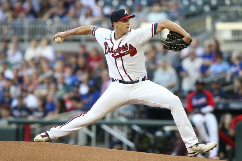Apr 28, 2022; Atlanta, Georgia, USA; Atlanta Braves starting pitcher Kyle Wright (30) throws against the Chicago Cubs in the first inning at Truist Park. Mandatory Credit: Brett Davis-USA TODAY Sports