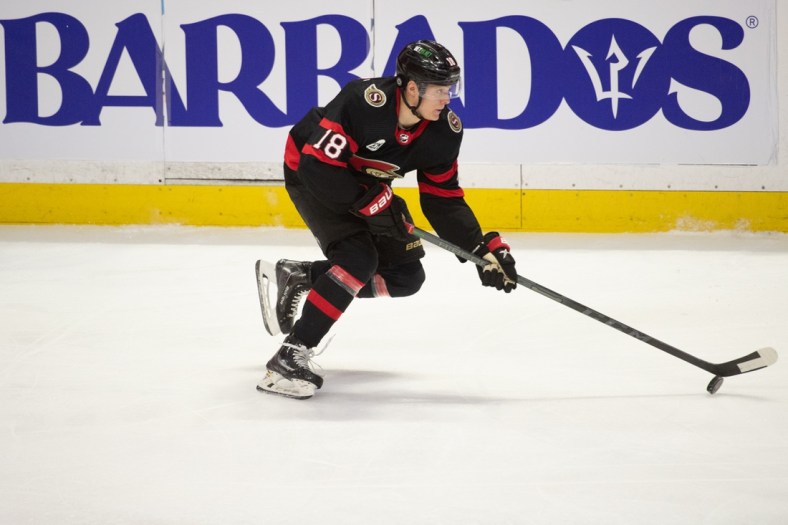 Apr 28, 2022; Ottawa, Ontario, CAN; Ottawa Senators left wing Tim Stutzle (18) skates with the puck in the third period against the Florida Panthers at the Canadian Tire Centre. Mandatory Credit: Marc DesRosiers-USA TODAY Sports
