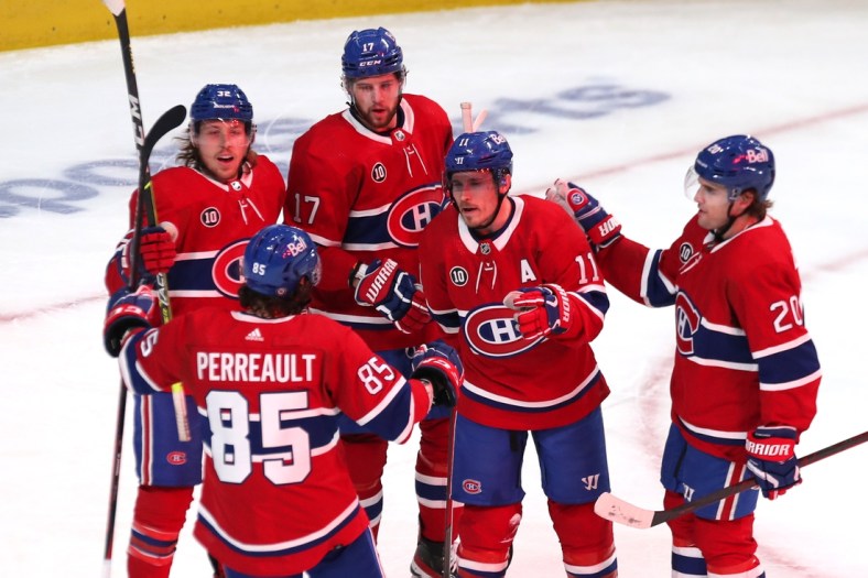 Apr 29, 2022; Montreal, Quebec, CAN; Montreal Canadiens right wing Brendan Gallagher (11) celebrates his goal against Florida Panthers with teammates during the first period at Bell Centre. Mandatory Credit: Jean-Yves Ahern-USA TODAY Sports