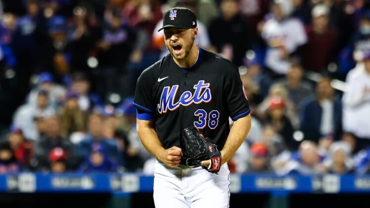 Apr 29, 2022; New York City, New York, USA; New York Mets relief pitcher Tylor Megill (38) reacts to a strikeout against the Philadelphia Phillies during the fifth inning of a baseball game at Citi Field. Mandatory Credit: Jessica Alcheh-USA TODAY Sports