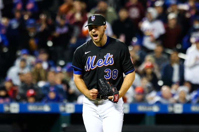 Apr 29, 2022; New York City, New York, USA; New York Mets relief pitcher Tylor Megill (38) reacts to a strikeout against the Philadelphia Phillies during the fifth inning of a baseball game at Citi Field. Mandatory Credit: Jessica Alcheh-USA TODAY Sports