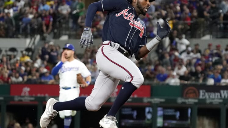 Apr 29, 2022; Arlington, Texas, USA; Atlanta Braves second baseman Travis Demeritte (48) rounds the bases on an inside the park home run during the third inning against the Texas Rangers at Globe Life Field. Mandatory Credit: Raymond Carlin III-USA TODAY Sports