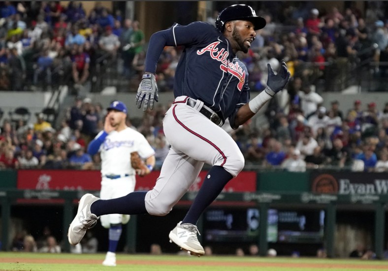 Apr 29, 2022; Arlington, Texas, USA; Atlanta Braves second baseman Travis Demeritte (48) rounds the bases on an inside the park home run during the third inning against the Texas Rangers at Globe Life Field. Mandatory Credit: Raymond Carlin III-USA TODAY Sports