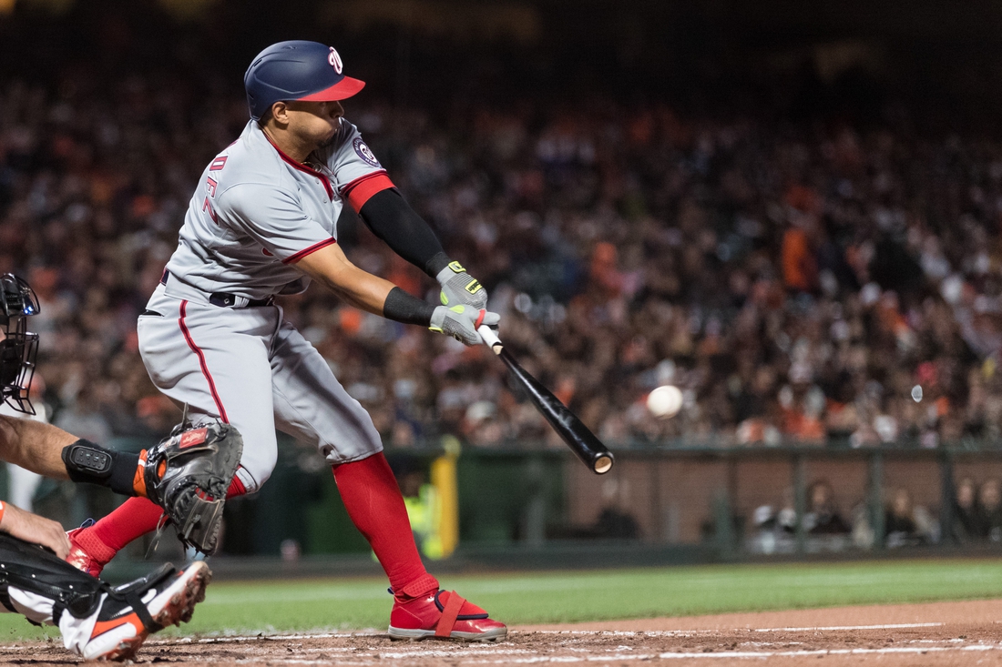 Apr 29, 2022; San Francisco, California, USA;  Washington Nationals second baseman Cesar Hernandez (1) hits a single against the San Francisco Giants during the fourth inning at Oracle Park. Mandatory Credit: John Hefti-USA TODAY Sports