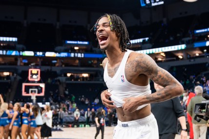 Apr 29, 2022; Minneapolis, Minnesota, USA; Memphis Grizzlies guard Ja Morant (12) celebrates after the game against the Minnesota Timberwolves after game six of the first round for the 2022 NBA playoffs at Target Center. Mandatory Credit: Brad Rempel-USA TODAY Sports