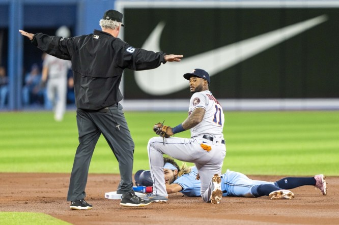 George Springer of the Houston Astros steals second base in the