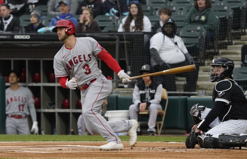 Apr 30, 2022; Chicago, Illinois, USA; Los Angeles Angels right fielder Taylor Ward (3) hits a single against the Chicago White Sox during the first inning at Guaranteed Rate Field. Mandatory Credit: David Banks-USA TODAY Sports