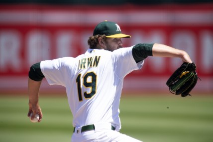 Apr 30, 2022; Oakland, California, USA; Oakland Athletics starting pitcher Cole Irvin (19) delivers a pitch against the Cleveland Guardians in the second inning at RingCentral Coliseum. Mandatory Credit: D. Ross Cameron-USA TODAY Sports