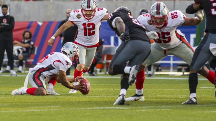 Apr 30, 2022; Birmingham, AL, USA; Tampa Bay Bandits kicker Tyler Rausa (12) kicks the game winning field goal against the Houston Gamblers with 14 seconds left in the second half at Protective Stadium. Mandatory Credit: Vasha Hunt-USA TODAY Sports