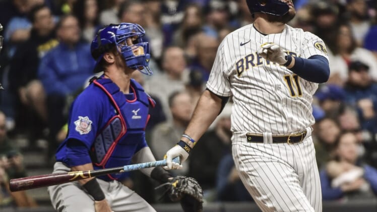 Apr 30, 2022; Milwaukee, Wisconsin, USA;  Milwaukee Brewers first baseman Rowdy Tellez (11) hits a two run home run against the Chicago Cubs in the fifth inning at American Family Field. Mandatory Credit: Benny Sieu-USA TODAY Sports