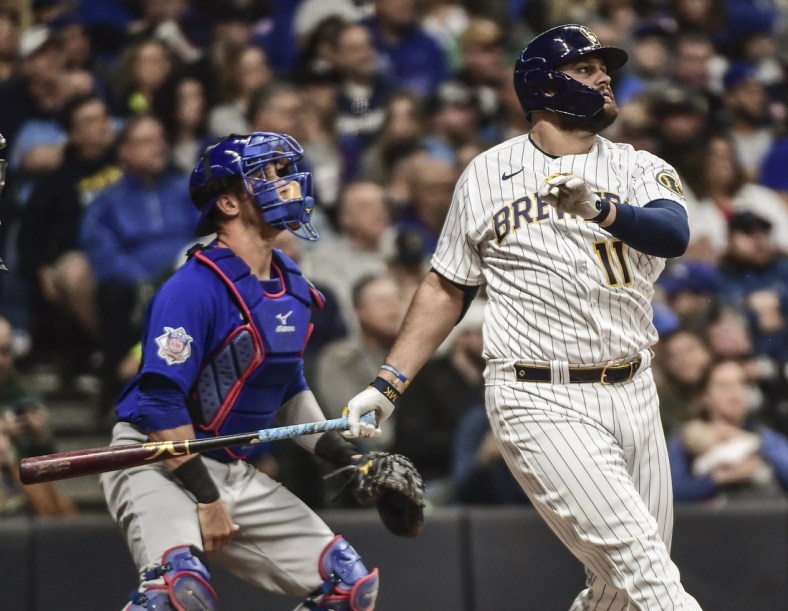 Apr 30, 2022; Milwaukee, Wisconsin, USA;  Milwaukee Brewers first baseman Rowdy Tellez (11) hits a two run home run against the Chicago Cubs in the fifth inning at American Family Field. Mandatory Credit: Benny Sieu-USA TODAY Sports