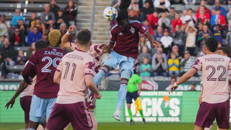 eApr 30, 2022; Commerce City, Colorado, USA; Colorado Rapids defender Lalas Abubakar (6) heads the ball against the Portland Timbers in the first half at Dick's Sporting Goods Park. Mandatory Credit: Ron Chenoy-USA TODAY Sports