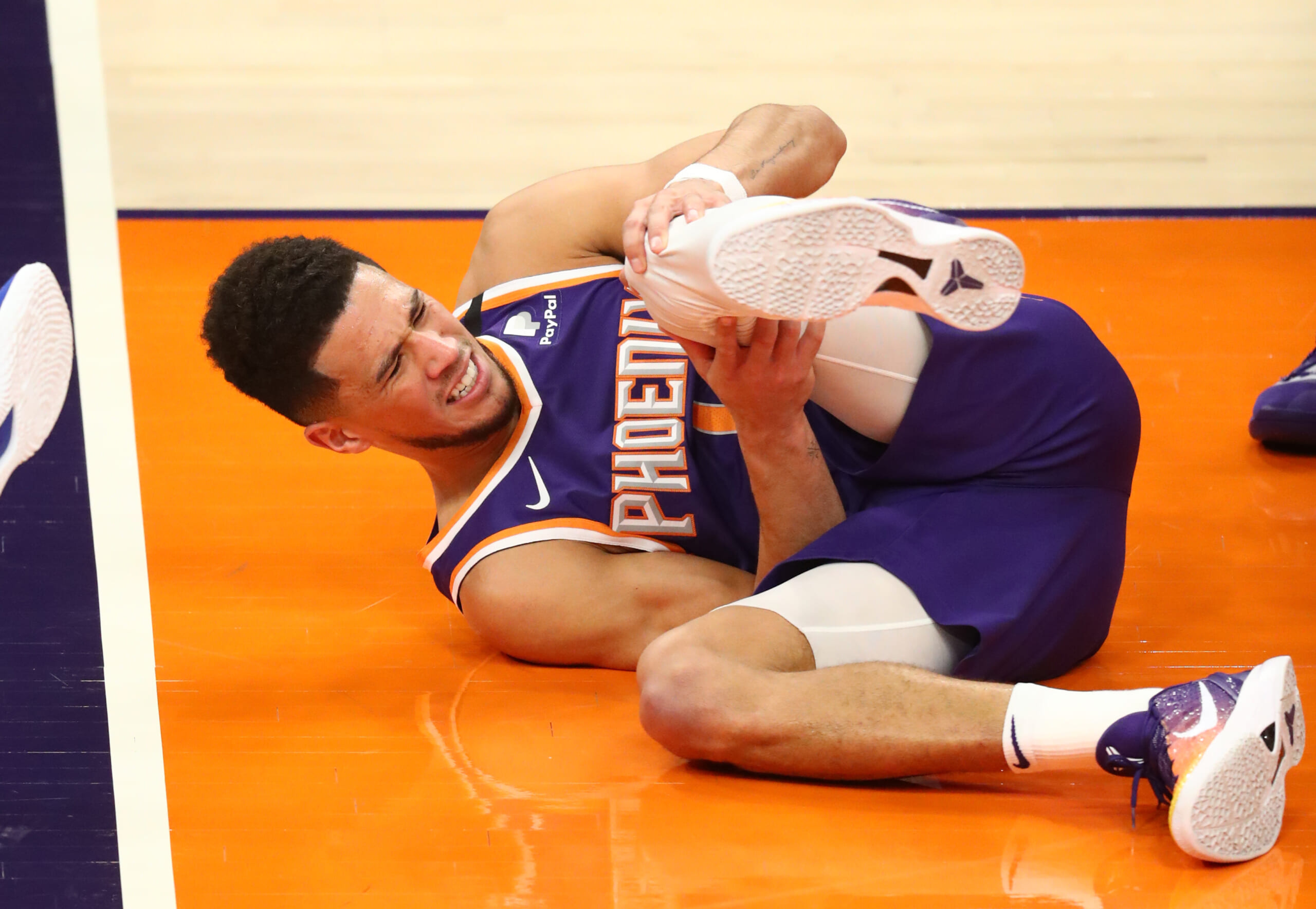 Devin Booker out 2–3 weeks for Suns with hamstring injury, per report -  Sports Illustrated