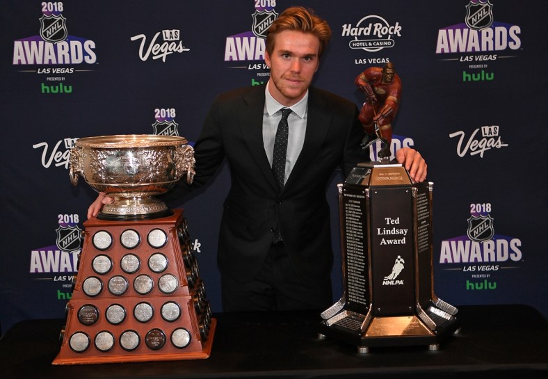 Jun 20, 2018; Las Vegas, NV, USA; Connor McDavid poses with the Art Ross and Ted Lindsay awards during the 2018 NHL Awards at Hard Rock Hotel and Casino. Mandatory Credit: Stephen R. Sylvanie-USA TODAY Sports