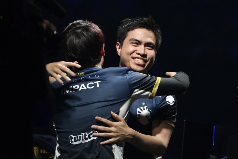 Apr 13, 2019; St. Louis , MO, USA; Team Liquid member Jake Puchero hugs Eonyoung Jeong after defeating TSM in the fifth game to win the League of Legends Championship Series Spring Finals at Chaifetz Arena. Mandatory Credit: Jeff Curry-USA TODAY Sports