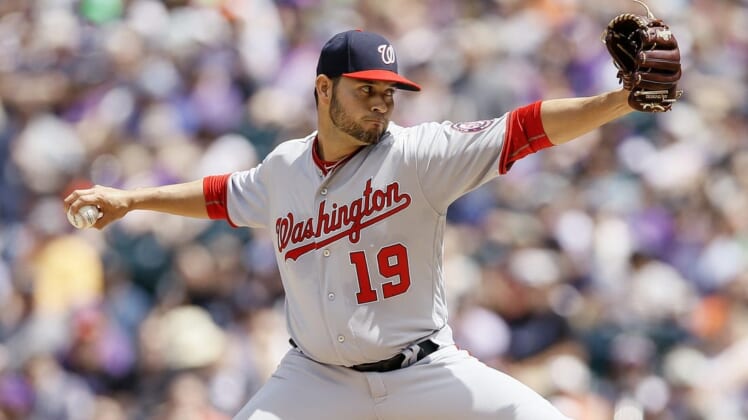 Apr 24, 2019; Denver, CO, USA; Washington Nationals starting pitcher Anibal Sanchez (19) pitches in the first inning against the Colorado Rockies at Coors Field. Mandatory Credit: Isaiah J. Downing-USA TODAY Sports