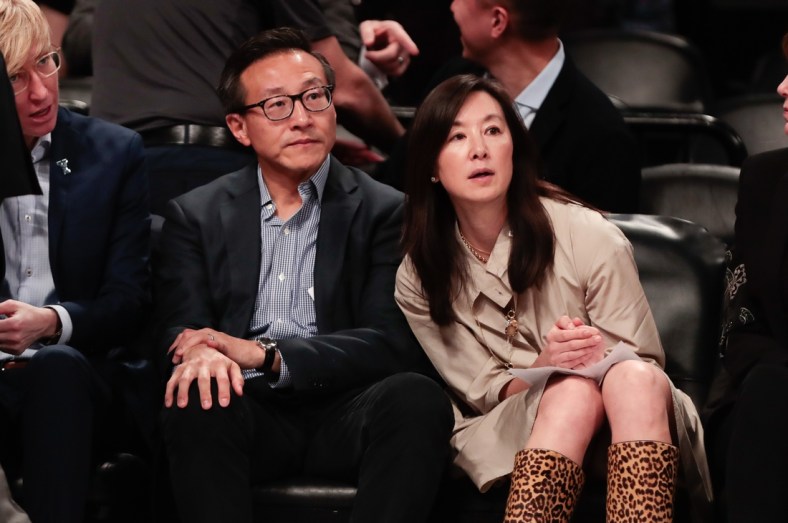 May 9, 2019; New York City, NY, USA; Taiwanese businessman Joe Tsai (left) looks on during the second half of the preseason WNBA game between the New York Liberty and the China National Team at Barclays Center.  Mandatory Credit: Vincent Carchietta-USA TODAY Sports