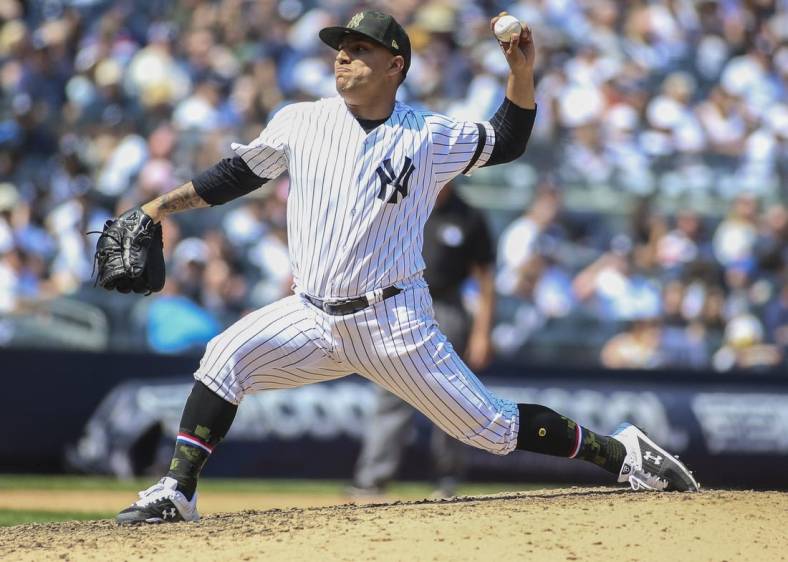 May 19, 2019; Bronx, NY, USA; New York Yankees pitcher Nestor Cortes Jr. (67) pitches in the sixth inning against the Tampa Bay Rays at Yankee Stadium. Mandatory Credit: Wendell Cruz-USA TODAY Sports