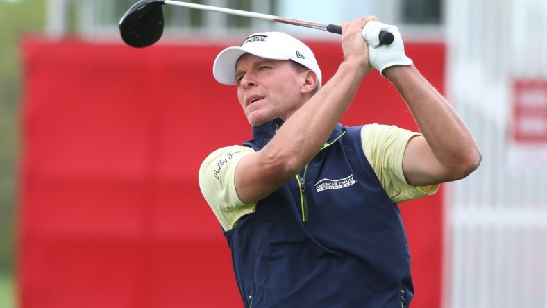 Steve Stricker watches the flight of his ball after teeing off on the 1st hole.

Steve Stricker Senior Pga A