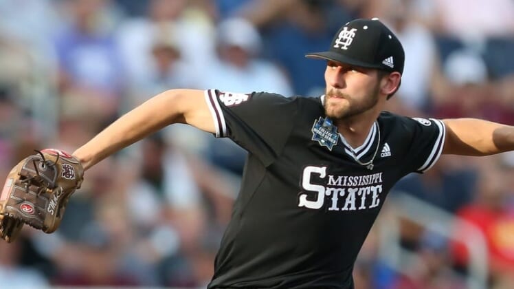 Mississippi State's Ethan Small (44) releases a pitch in the third inning. Mississippi State defeated Auburn in the opening round of the NCAA College World Series on Sunday, June 16.2019 at TD Ameritrade Park in Omaha.Msu Auburn College World Series